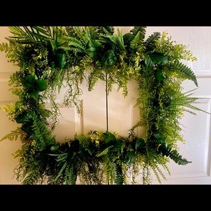 Beautiful frame made with tropical greenery.